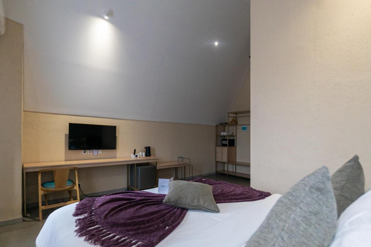 Tanaga Coliving Hotel เซมินยัค ภายนอก รูปภาพ